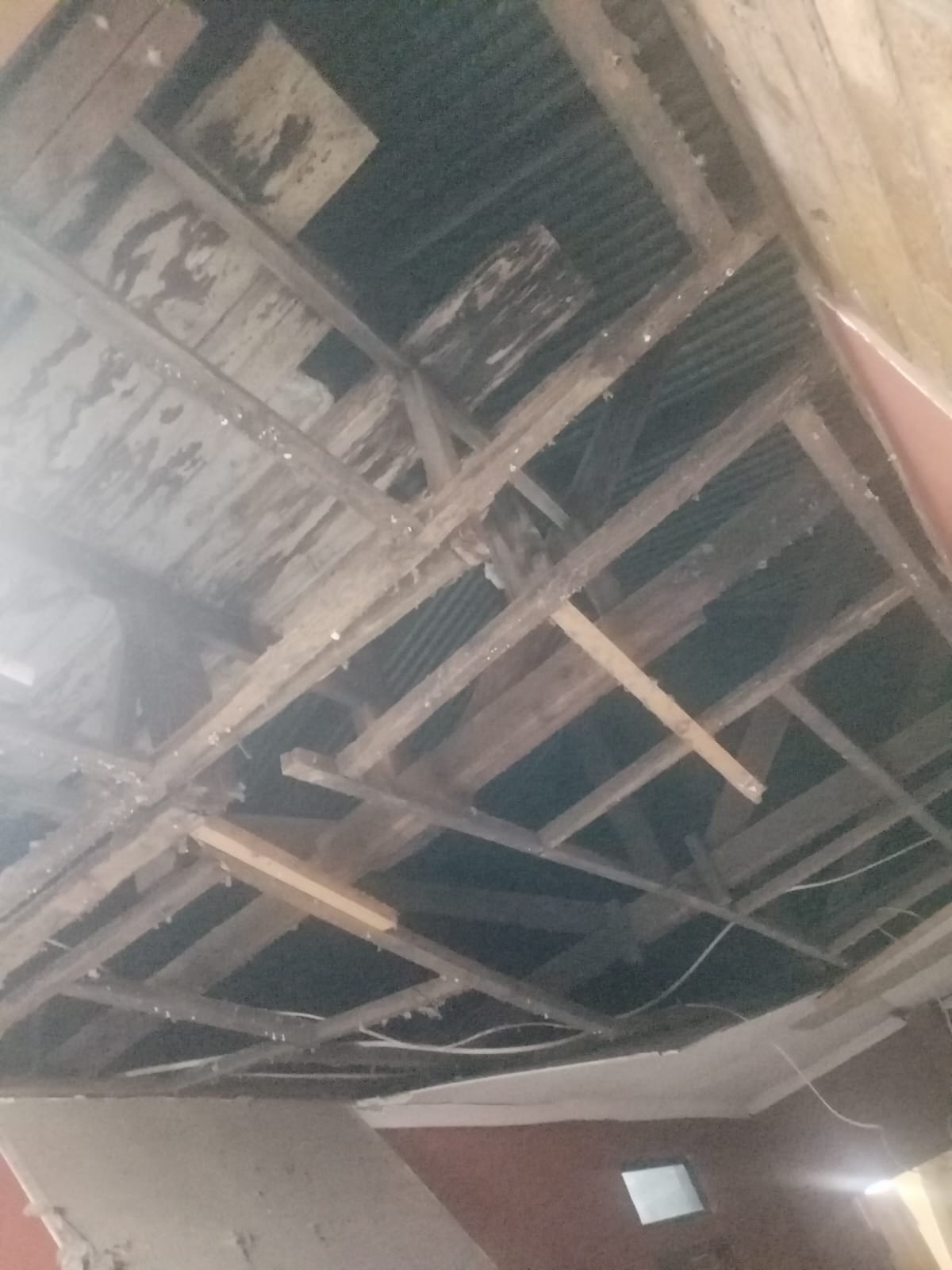 Exposed ceiling beams and trusses during repair and maintenance